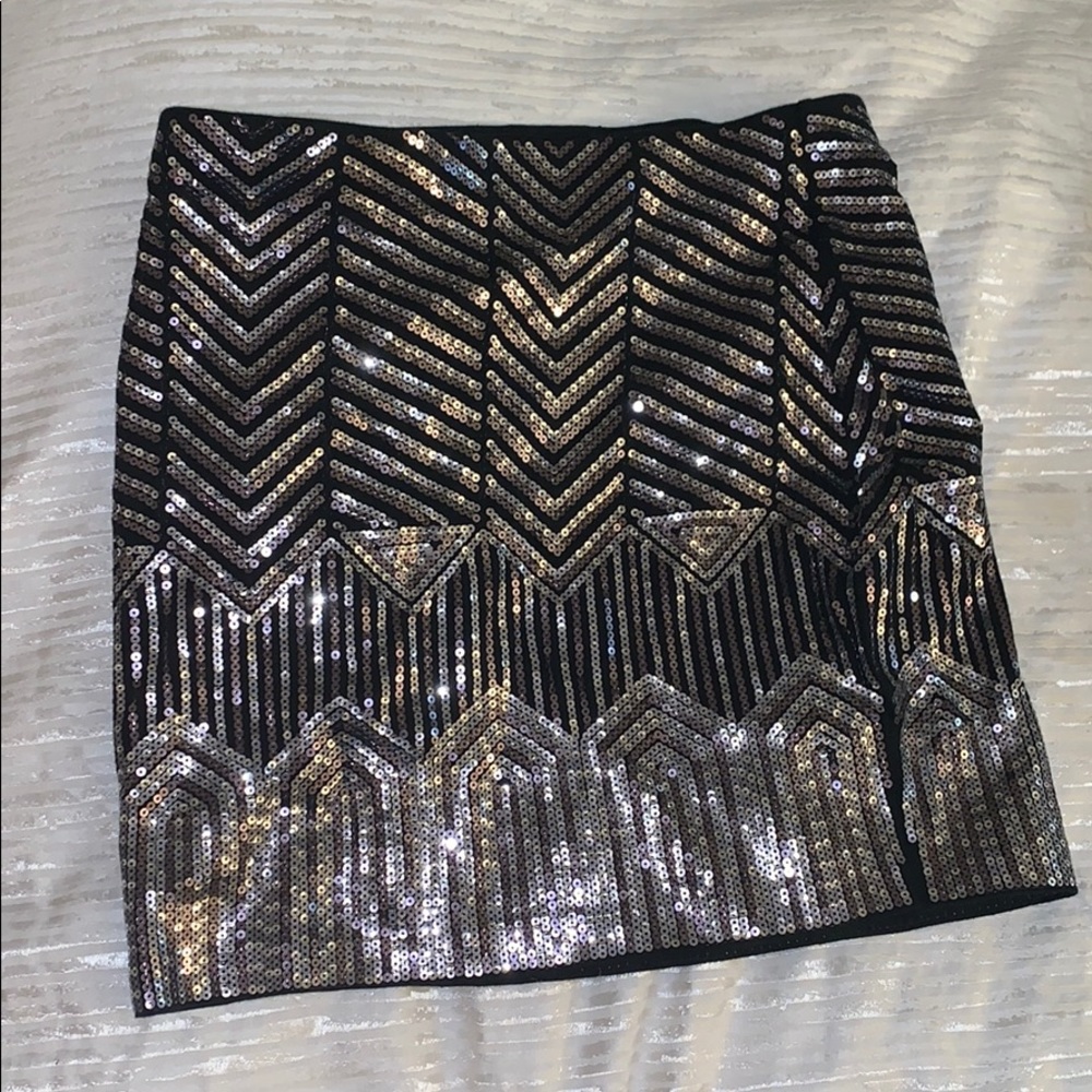 Black sequin skirt, with gold and silver sequins